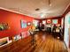 Spacious art gallery featuring hardwood floors, track lighting, and an eclectic array of vibrant artwork on display at 1019 10Th W Ave, Bradenton, FL 34205