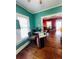 Cozy gallery with a display case, hardwood floors, a window and views into another room at 1019 10Th W Ave, Bradenton, FL 34205