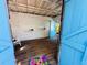The interior features white wood-paneled walls, wood flooring, and blue doors at 1019 10Th W Ave, Bradenton, FL 34205
