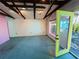 Bright room with exposed beam ceiling and colorful trim at 1019 10Th W Ave, Bradenton, FL 34205