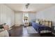 Cozy living room featuring a daybed with natural lighting from the window at 102 28Th W St, Bradenton, FL 34205