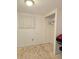 Cozy bedroom with simple decor, closet, and a window providing natural light at 10315 Cortez W Rd # 32-7, Bradenton, FL 34210