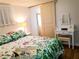 Comfortable bedroom with a queen bed and bright decor at 10315 Cortez W Rd # 32-7, Bradenton, FL 34210