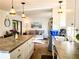 Contemporary kitchen with stainless steel appliances and an open concept design to the living area at 10315 Cortez W Rd # 32-7, Bradenton, FL 34210
