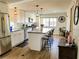 Bright and airy kitchen with modern appliances, an island, and lots of counter space at 10315 Cortez W Rd # 32-7, Bradenton, FL 34210