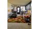 Cozy sunroom with comfortable furniture, abundant natural light, and a relaxing atmosphere at 10315 Cortez W Rd # 32-7, Bradenton, FL 34210