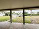 Relaxing back porch overlooking the canal, ready for entertaining at 104 Pops Ln, Nokomis, FL 34275
