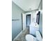 Bathroom featuring a single sink vanity, towel bar and ample natural light at 104 Pops Ln, Nokomis, FL 34275