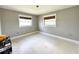 Bedroom with bright natural light and gray-painted walls at 104 Pops Ln, Nokomis, FL 34275