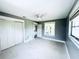 Spacious bedroom with carpet, ceiling fan, and natural light at 104 Pops Ln, Nokomis, FL 34275