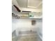 Walk-in closet with built-in shelving for convenient storage at 104 Pops Ln, Nokomis, FL 34275