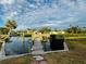 Dock offering stunning water views and access for boating at 104 Pops Ln, Nokomis, FL 34275