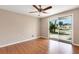 Bright room with wood floors and a sliding door giving access to an outdoor patio at 112 E Marland Ct, Nokomis, FL 34275