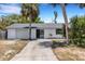 Charming single-story home with a driveway, garage, and well-maintained lawn at 112 E Marland Ct, Nokomis, FL 34275