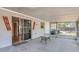 A covered, screened-in patio connects to the home's interior at 112 E Marland Ct, Nokomis, FL 34275