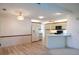 Open concept kitchen, seamlessly connecting the eat-in area with a well-equipped cooking space at 1279 Vermeer Dr, Nokomis, FL 34275