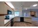 Kitchen with views of the living room, creating an inclusive space for cooking and socializing at 1279 Vermeer Dr, Nokomis, FL 34275