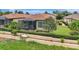 Beautiful screened lanai and landscaped backyard of a lovely home, perfect for relaxing outdoors at 13108 Torresina Ter, Bradenton, FL 34211