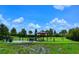 Community dog park featuring a shaded seating area, fully fenced with room for dogs to run at 13108 Torresina Ter, Bradenton, FL 34211