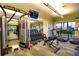 Fitness center with modern equipment, weights, and treadmills for a complete workout at 13108 Torresina Ter, Bradenton, FL 34211