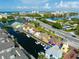 Waterfront view of colorful buildings on a pier with boats docked; buildings in the background at 1723 Laramie St, Sarasota, FL 34231