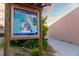 A sign showing directions to Siesta Key Beach Access 12 at 1723 Laramie St, Sarasota, FL 34231