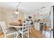 Charming kitchen with a dining area, granite countertops, stainless steel appliances and tile flooring at 1723 Laramie St, Sarasota, FL 34231