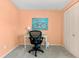 Comfortable work space with a desk, office chair, and artwork at 1723 Laramie St, Sarasota, FL 34231