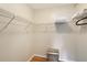 Spacious walk-in closet with ample shelving, providing plenty of storage options at 2124 N Tamiami Trl # 108, Sarasota, FL 34234