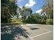 Community basketball court with lush green surroundings at 2475 Wood Oak Dr, Sarasota, FL 34232
