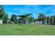 Community playground with colorful play equipment, perfect for Gathering fun at 2475 Wood Oak Dr, Sarasota, FL 34232