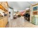 Spacious living room featuring tile flooring and seamlessly blending multiple living areas for versatile enjoyment at 2630 Bucida Dr, Sarasota, FL 34232