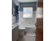 Bathroom featuring tiled walls, with a shower and tub combo, all bathed in soft natural light at 2833 62Nd N St, St Petersburg, FL 33710
