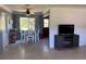 Open-concept dining area next to the living room for easy access and functionality at 2833 62Nd N St, St Petersburg, FL 33710
