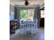Cozy dining area filled with natural light, complemented by stylish furniture and tasteful décor at 2833 62Nd N St, St Petersburg, FL 33710