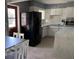 Eat-in kitchen with updated appliances and ample counter space, perfect for cooking and dining at 2833 62Nd N St, St Petersburg, FL 33710