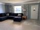 Comfortable living room with a large sectional sofa, perfect for relaxing and entertaining at 2833 62Nd N St, St Petersburg, FL 33710