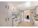 Kitchen featuring ample cabinetry, a microwave, and a stove for all your cooking needs at 3127 Dawson St, Sarasota, FL 34239