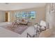 Sunlit living room with stylish furnishings, a large window, and an inviting atmosphere at 3127 Dawson St, Sarasota, FL 34239