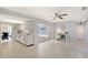 Open-concept living area with access to the kitchen and pool, and a dedicated desk space at 3127 Dawson St, Sarasota, FL 34239
