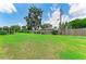 Expansive backyard featuring lush green grass and plenty of space for outdoor activities at 3213 Mercer Rd, Bradenton, FL 34207