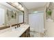Beautiful bathroom featuring modern vanity, stylish fixtures, and a shower with curtain at 3213 Mercer Rd, Bradenton, FL 34207