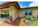 Charming front entrance with decorative details and terra cotta tile at 3213 Mercer Rd, Bradenton, FL 34207