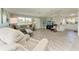 Airy living space with modern décor, ceiling fan and lots of seating at 3213 Mercer Rd, Bradenton, FL 34207