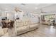 Bright, spacious living room flowing into a dining area and open kitchen at 3500 Liberty St, Port Charlotte, FL 33948