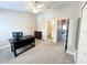 A bright and spacious bedroom is staged as a home office at 396 Countryside Key Blvd, Oldsmar, FL 34677