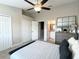 Primary bedroom features ceiling fan, large closet and ensuite bathroom at 396 Countryside Key Blvd, Oldsmar, FL 34677