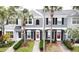 Charming townhome with well-manicured landscaping and a welcoming front entrance at 396 Countryside Key Blvd, Oldsmar, FL 34677