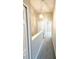An upstairs hallway featuring neutral paint and carpeted floors at 396 Countryside Key Blvd, Oldsmar, FL 34677