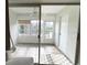 Covered outdoor patio with scenic views of the pond and surrounding community at 396 Countryside Key Blvd, Oldsmar, FL 34677